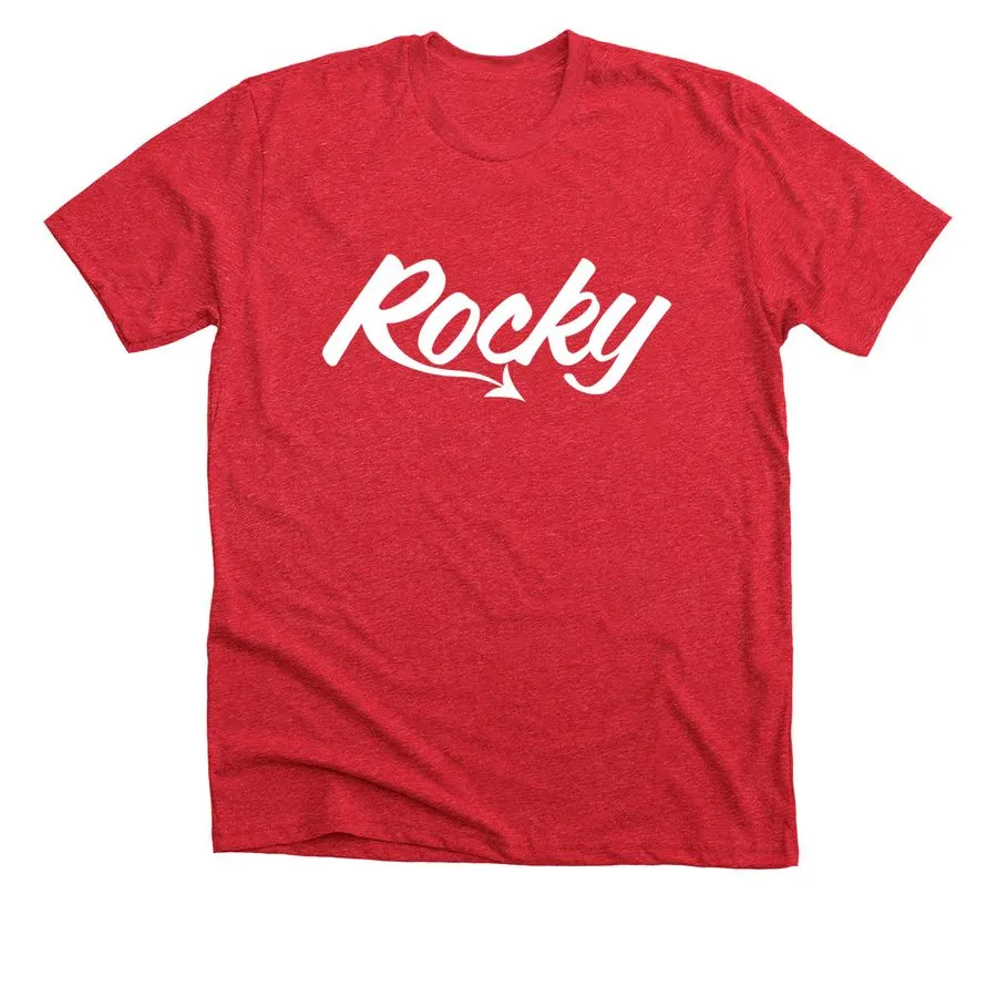 A photo of a red tee shirt with a white Rocky logo on the front